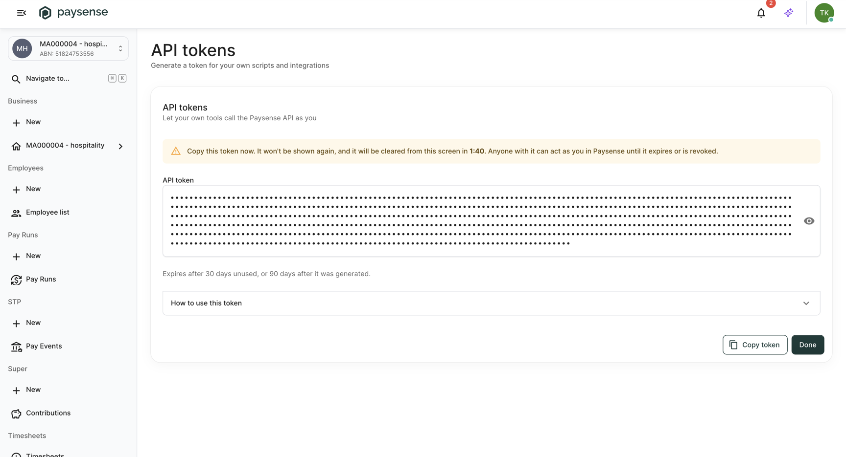 Issued API token, masked, with the 2-minute countdown warning and the Copy token and Done buttons